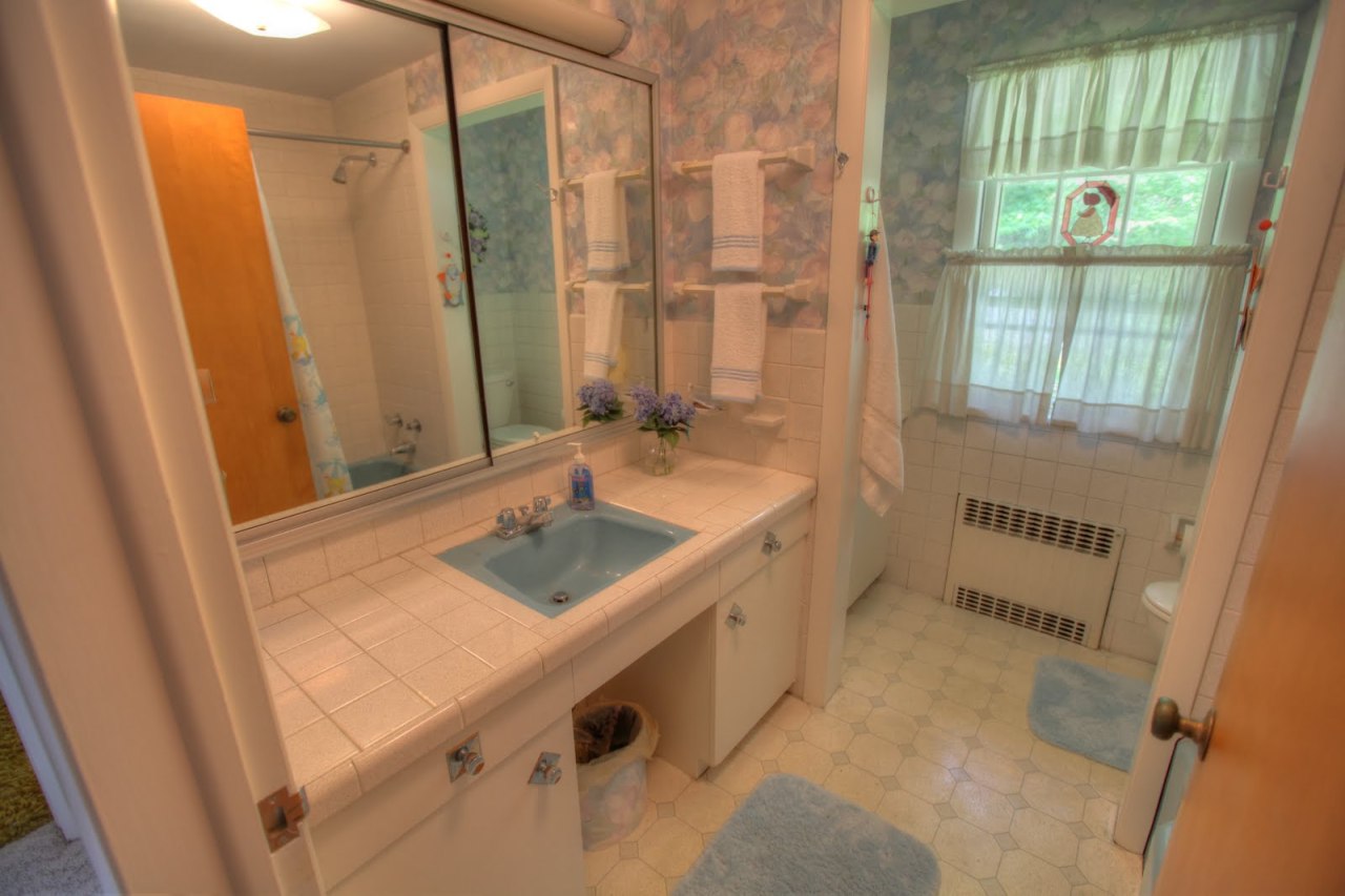 427 Pine Road Otis, MA 01029 - Photo 17 of 30 a bathroom with a sink and a mirror