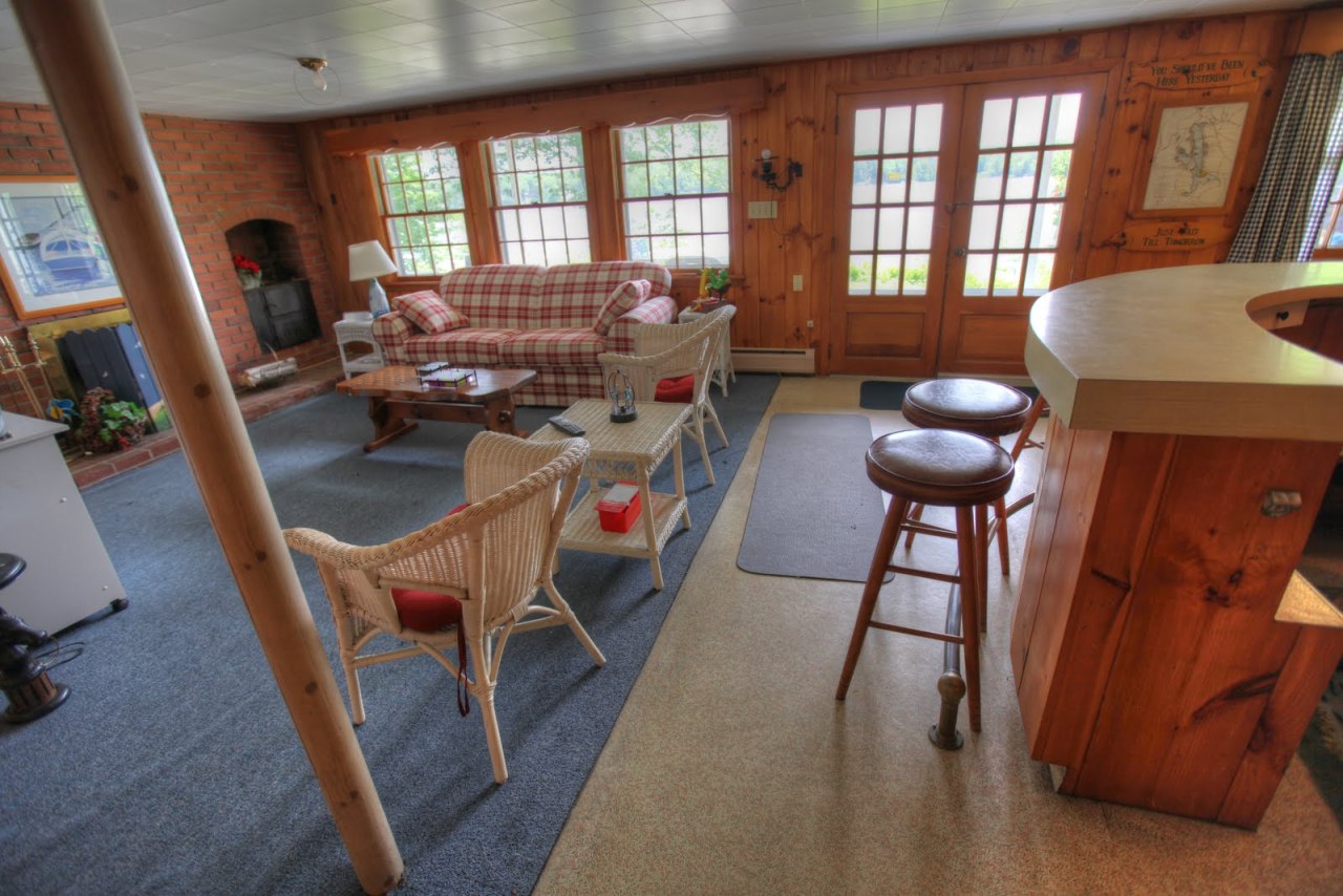 427 Pine Road Otis, MA 01029 - Photo 20 of 30 a living room with furniture and a flat screen tv