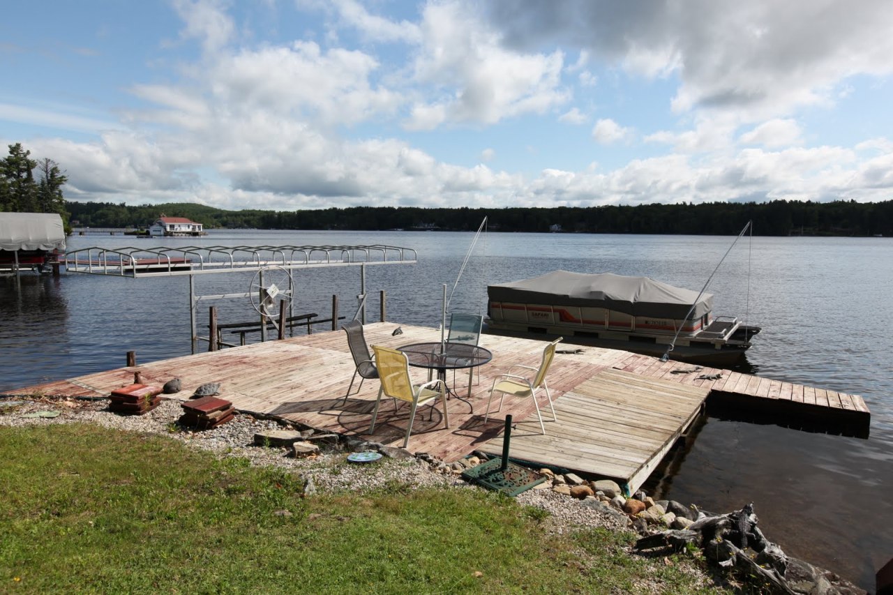 427 Pine Road Otis, MA 01029 - Photo 3 of 30 a view of a lake with a terrace