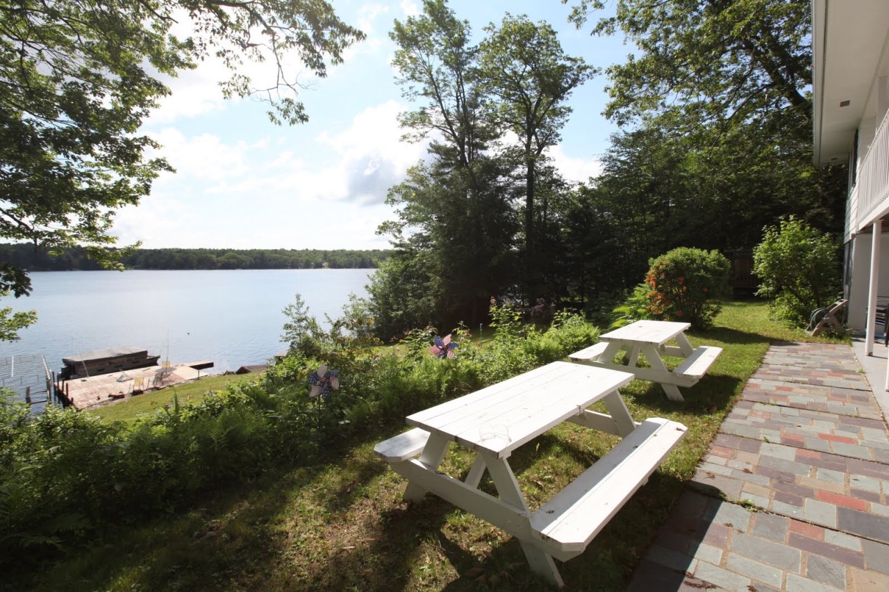 427 Pine Road Otis, MA 01029 - Photo 28 of 30 a view of a backyard with sitting area
