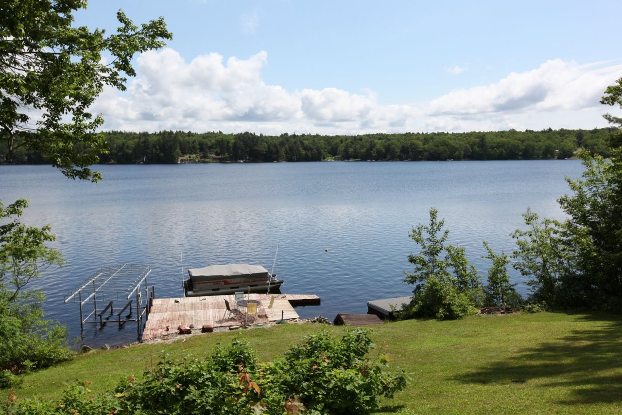 427 Pine Road Otis, MA 01029 - Photo 30 of 30 a lake view with a garden