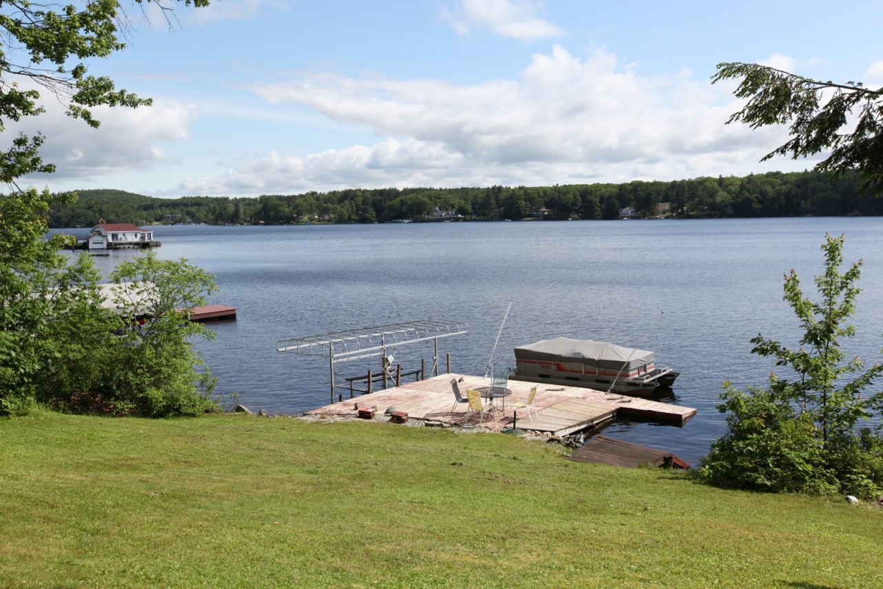 427 Pine Road Otis, MA 01029 - Photo 5 of 30 a lake view with a garden