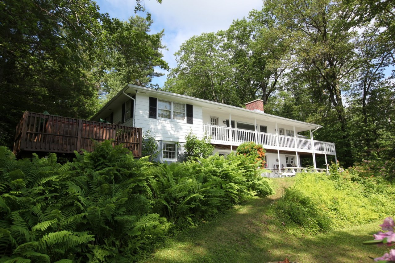 427 Pine Road Otis, MA 01029 - Photo 6 of 30 a house view with a garden space