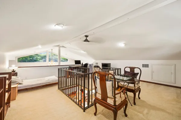 a view of a dining room with furniture window and outside view