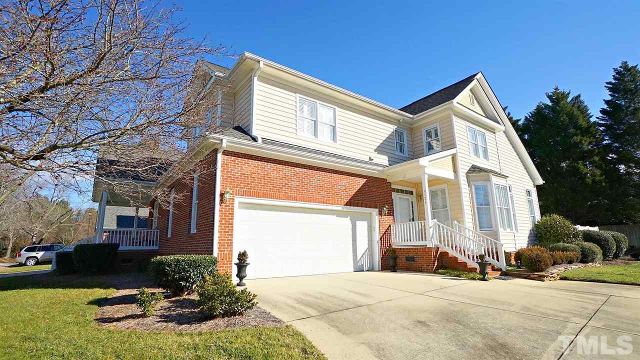 9124 Carrington Ridge Drive Raleigh, NC 27615 - Photo 1 of 24 a view of a house with a yard
