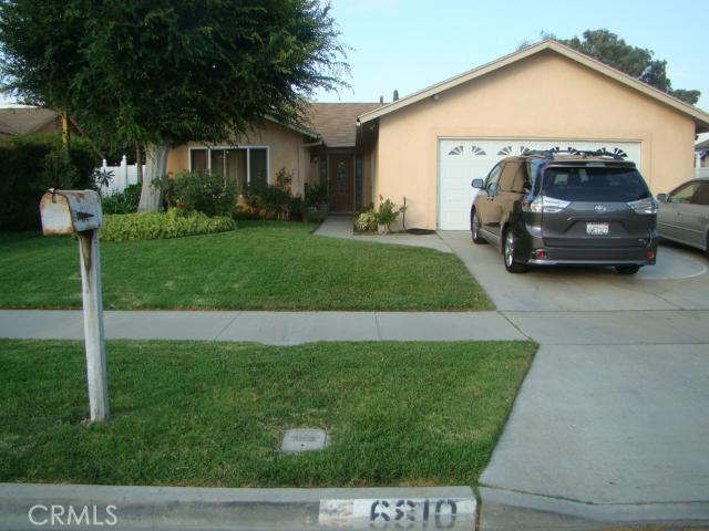 a view of a house with a back yard