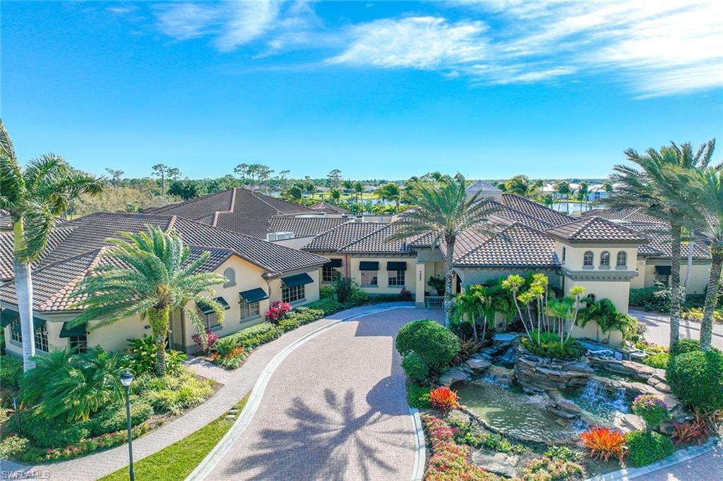 8468 Indian Wells Way Naples, FL 34113 - Photo 34 of 40 an aerial view of multiple house