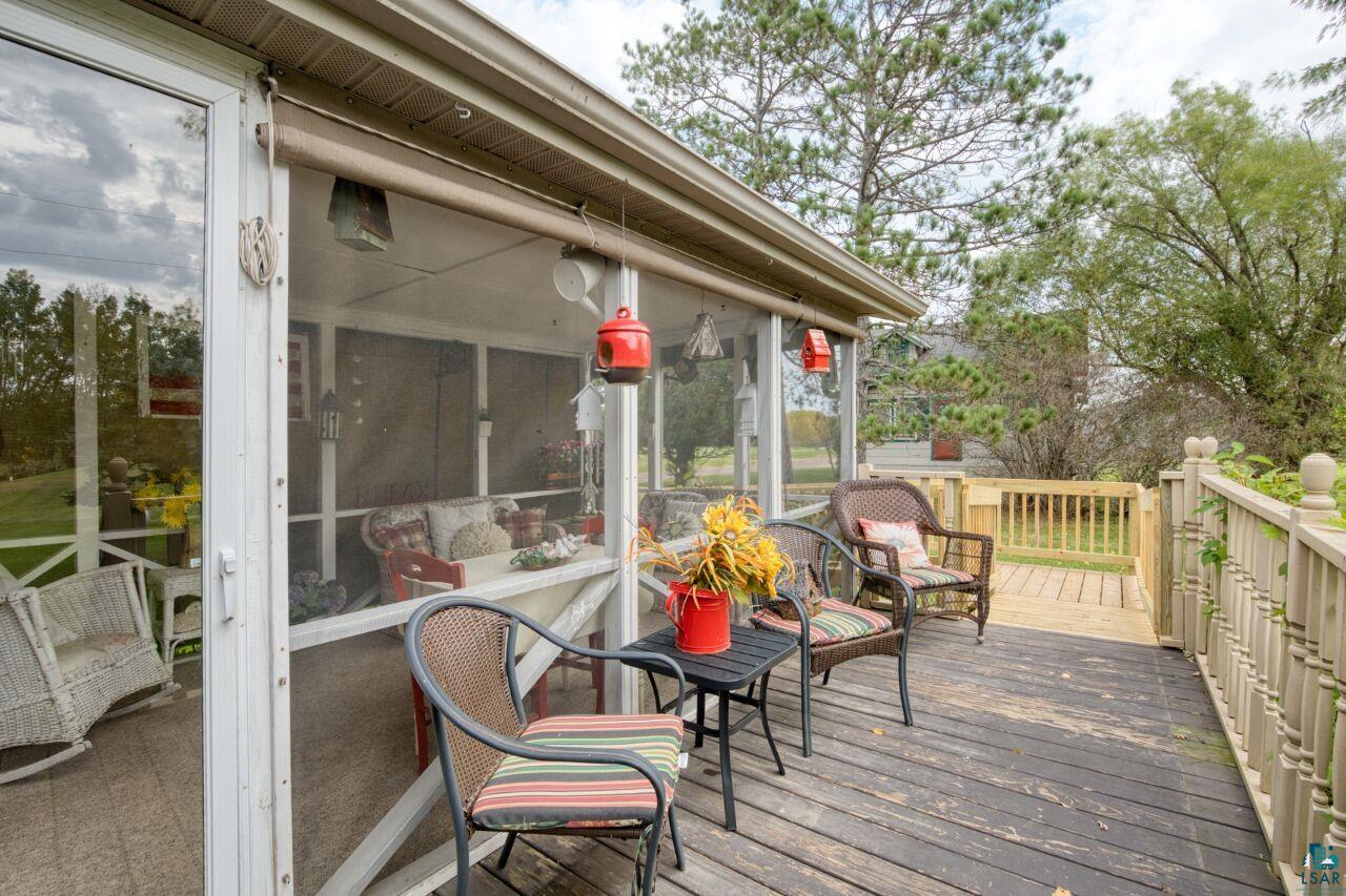 3360 North Leighton Road Hibbing, MN 55746 - Photo 31 of 60 Wooden terrace with a sunroom
