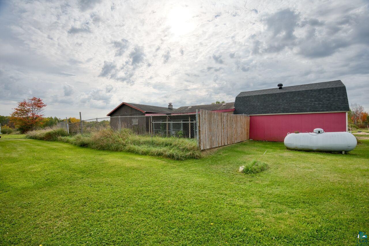 3360 North Leighton Road Hibbing, MN 55746 - Photo 49 of 60 View of yard featuring an outdoor structure