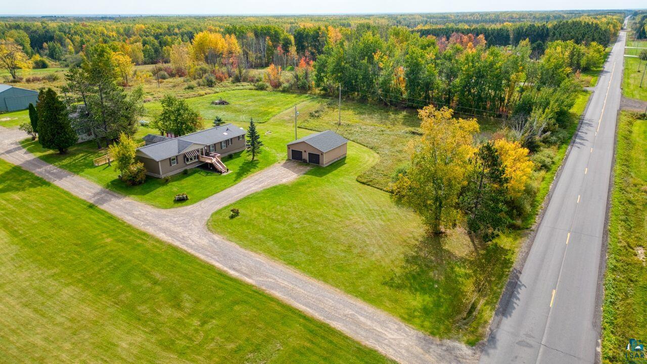 3360 North Leighton Road Hibbing, MN 55746 - Photo 51 of 60 View from above of property featuring a forest
