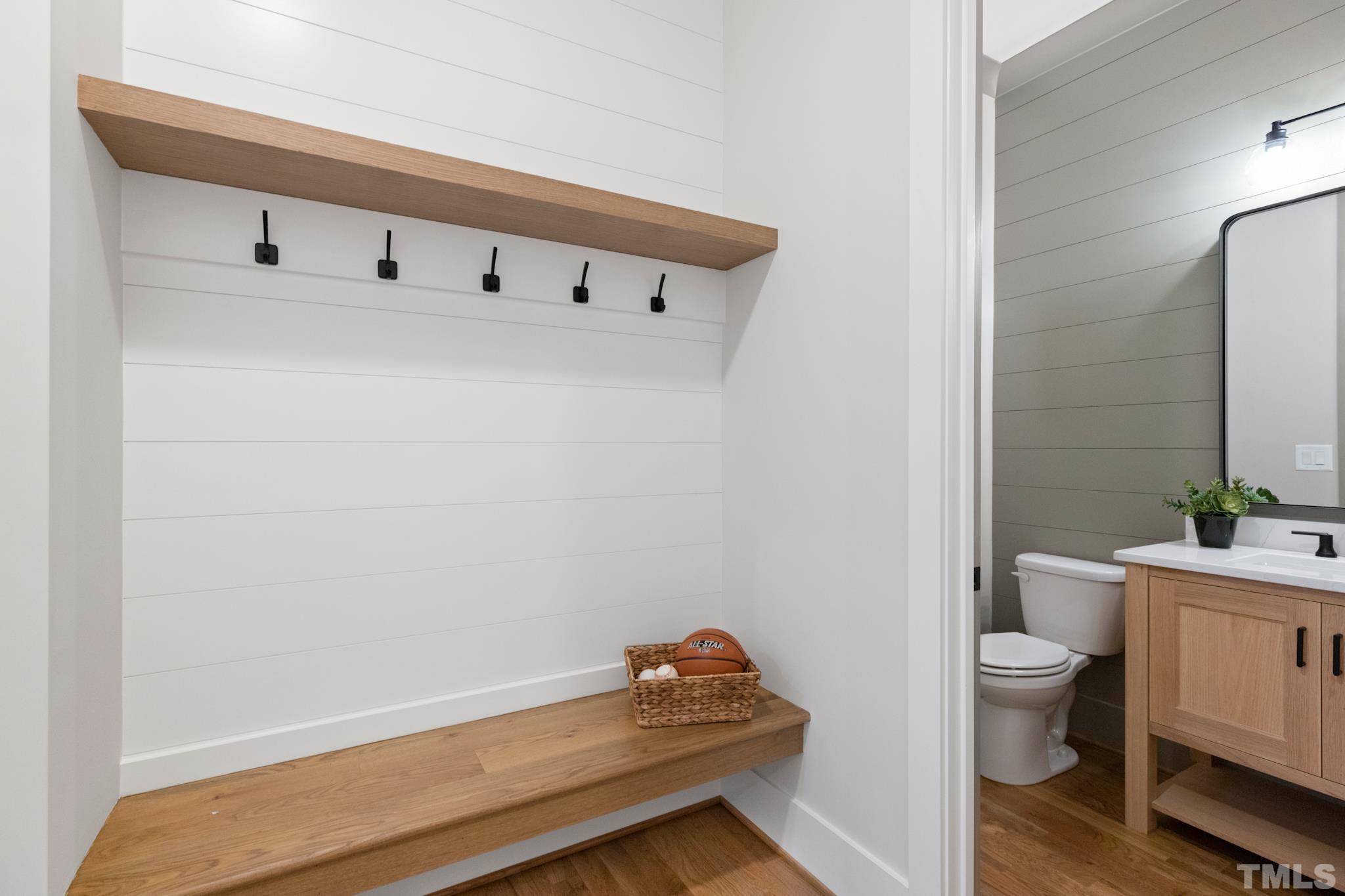 940 Harrison Ridge Road Wake Forest, NC 27587 - Photo 27 of 30 a room with a wooden floor and toilet