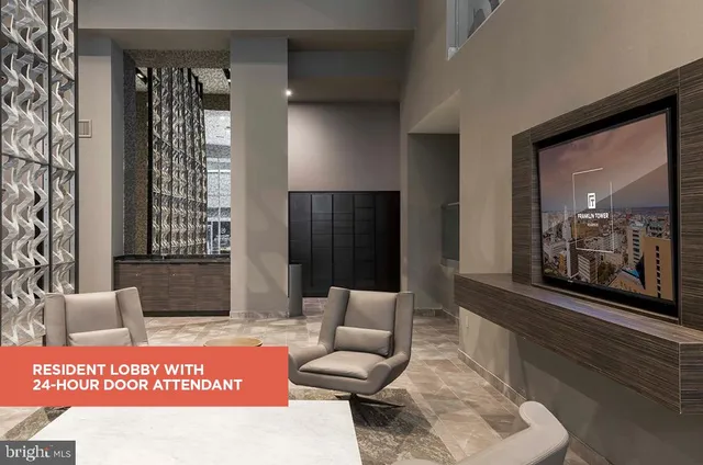 a view of a hallway with couch and dining area