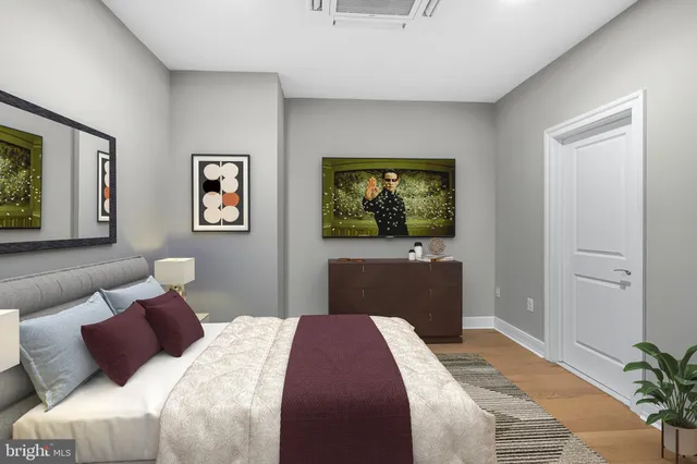 a bedroom with bed and window