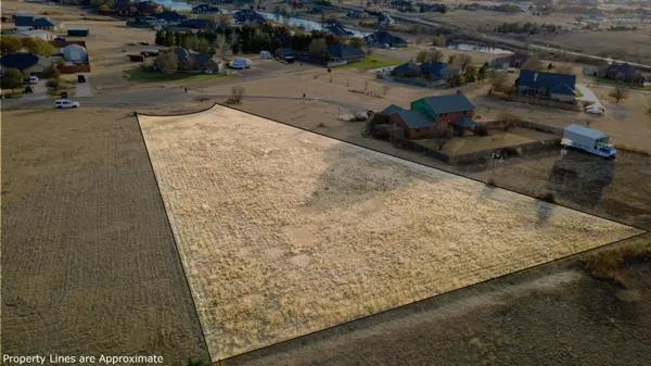 a view of swimming pool with seating area