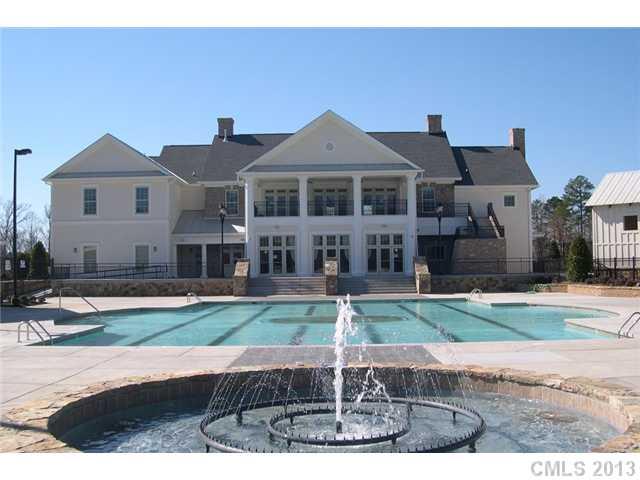 1437 Ridgehaven Road, Unit 160 Waxhaw, NC 28173 - Photo 7 of 10 a front view of a house with a yard
