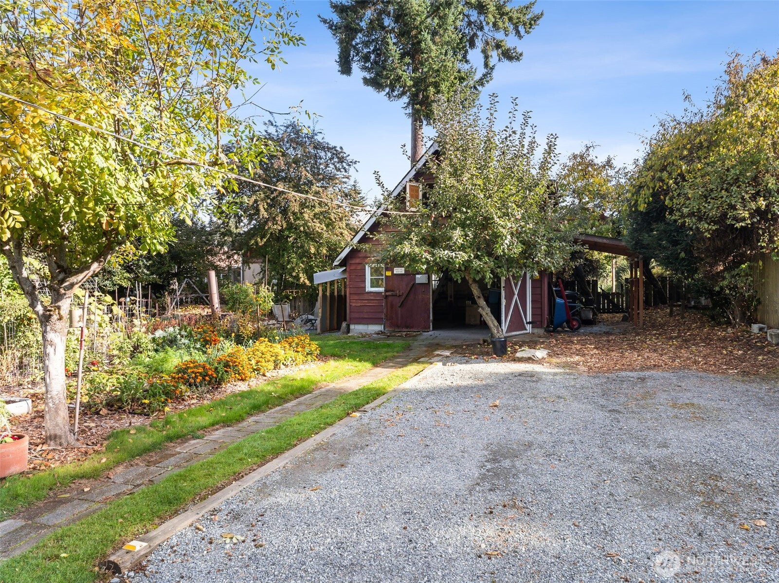 15620 21st Avenue Southwest Burien, WA 98166 - Photo 18 of 38 a view of a house with a yard and tree s