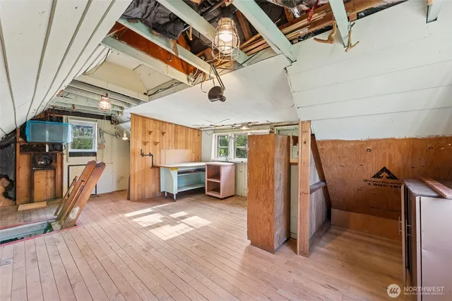 a view of a backyard with table and chairs