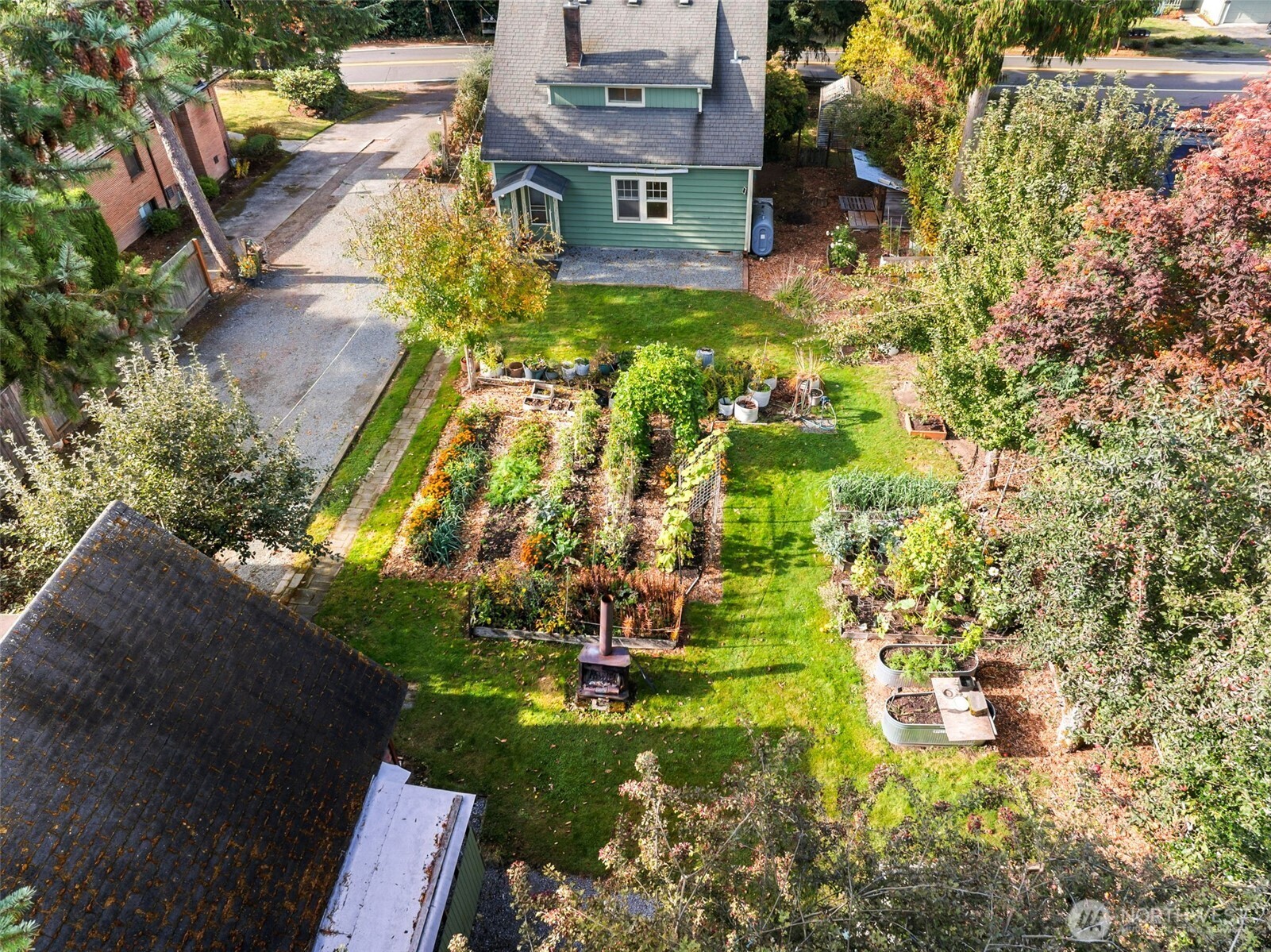 15620 21st Avenue Southwest Burien, WA 98166 - Photo 34 of 38 a aerial view of a house with a yard basket ball court and outdoor seating