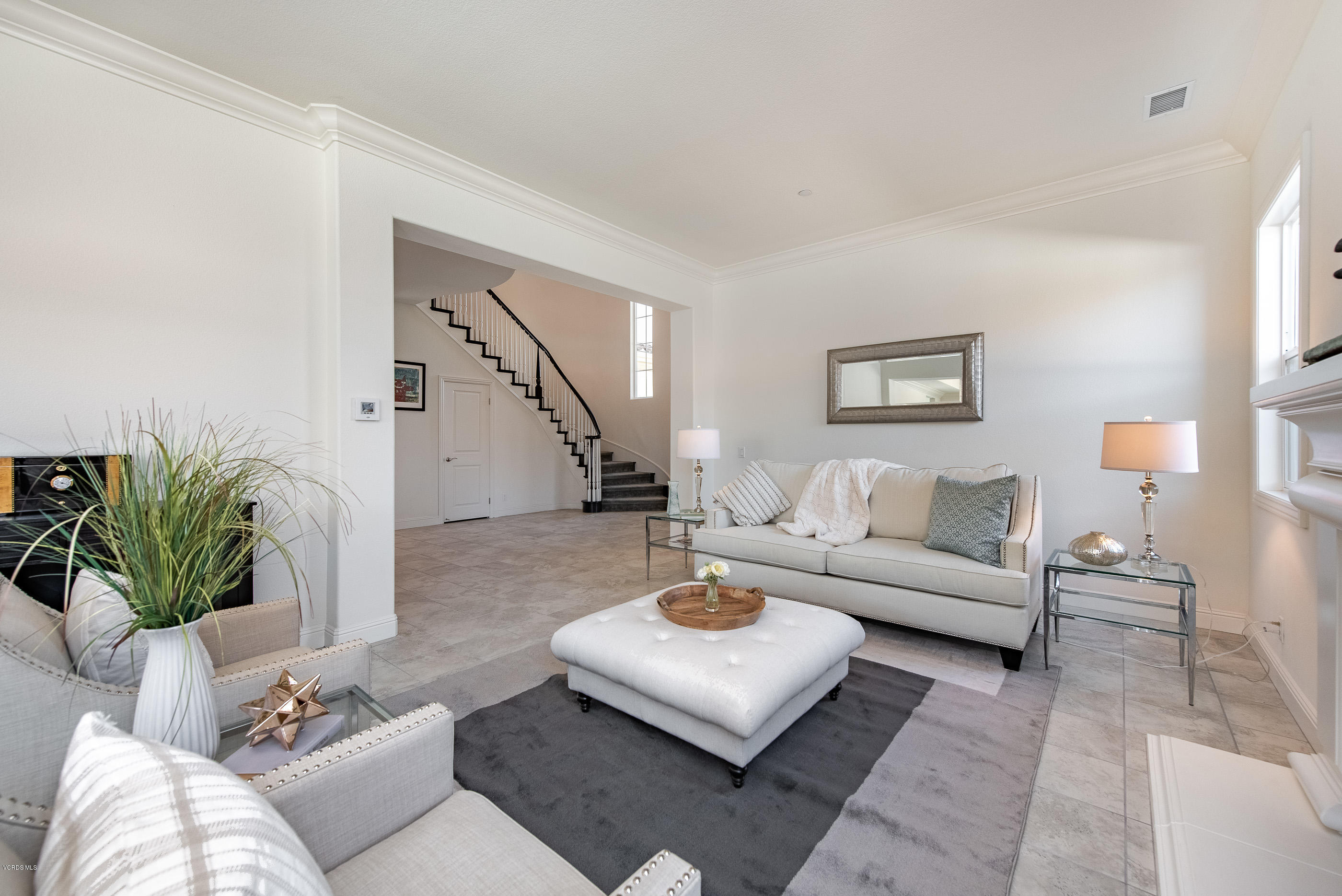 11276 Crenshaw Street Moorpark, CA 93021 - Photo 11 of 52 a living room with furniture and a potted plant