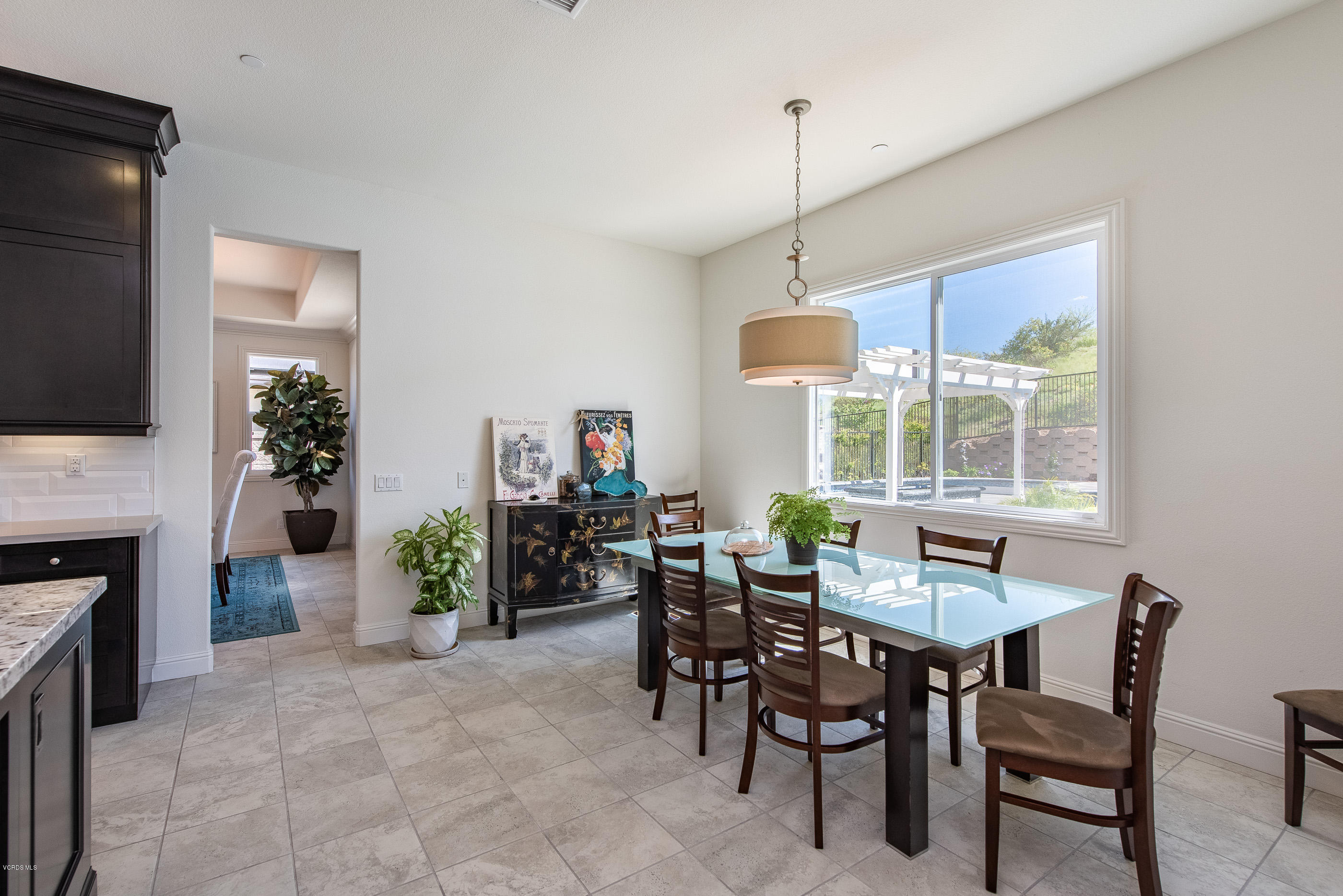 11276 Crenshaw Street Moorpark, CA 93021 - Photo 19 of 52 a view of a dining room with furniture window and outside view