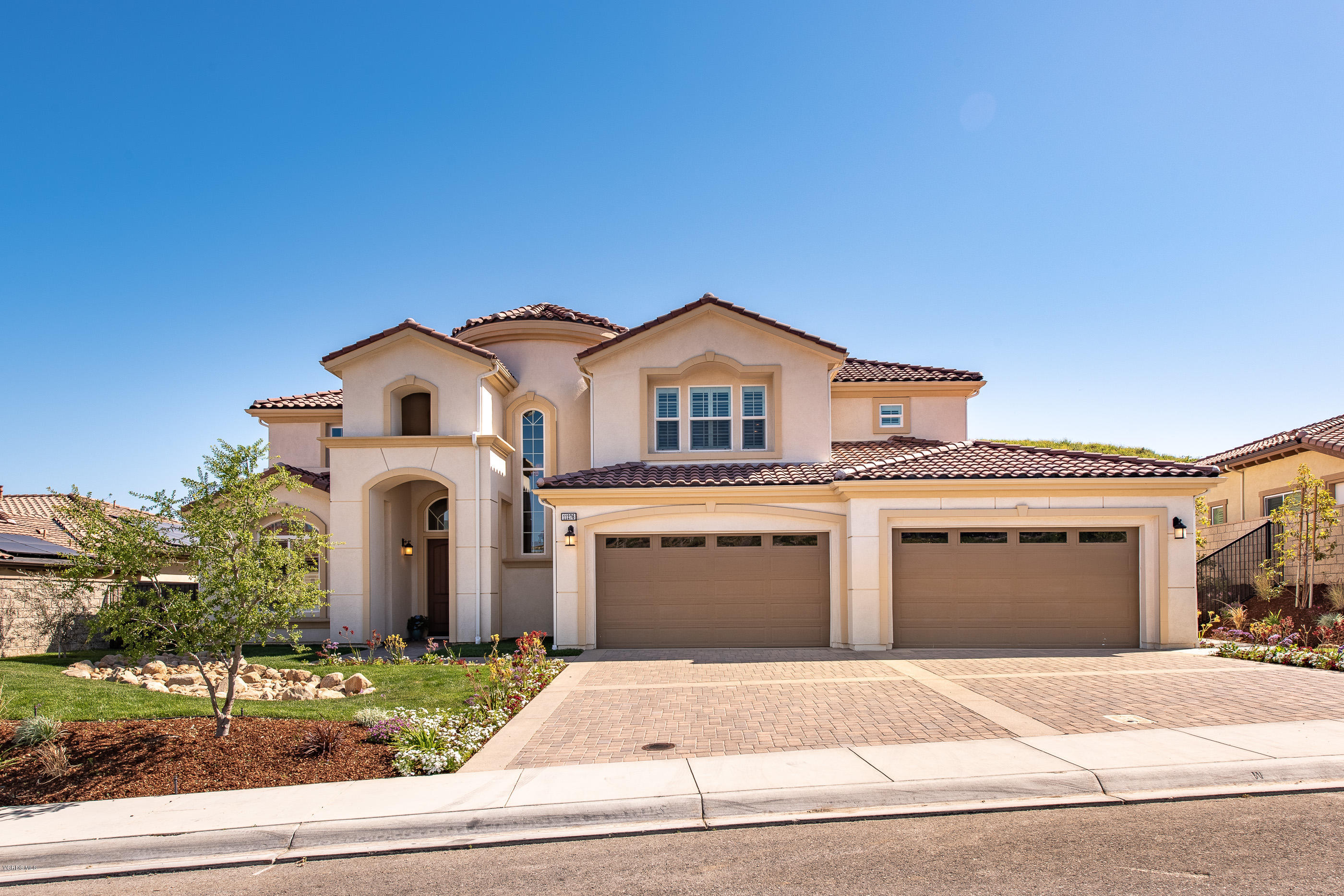 11276 Crenshaw Street Moorpark, CA 93021 - Photo 3 of 52 a front view of a house with garden