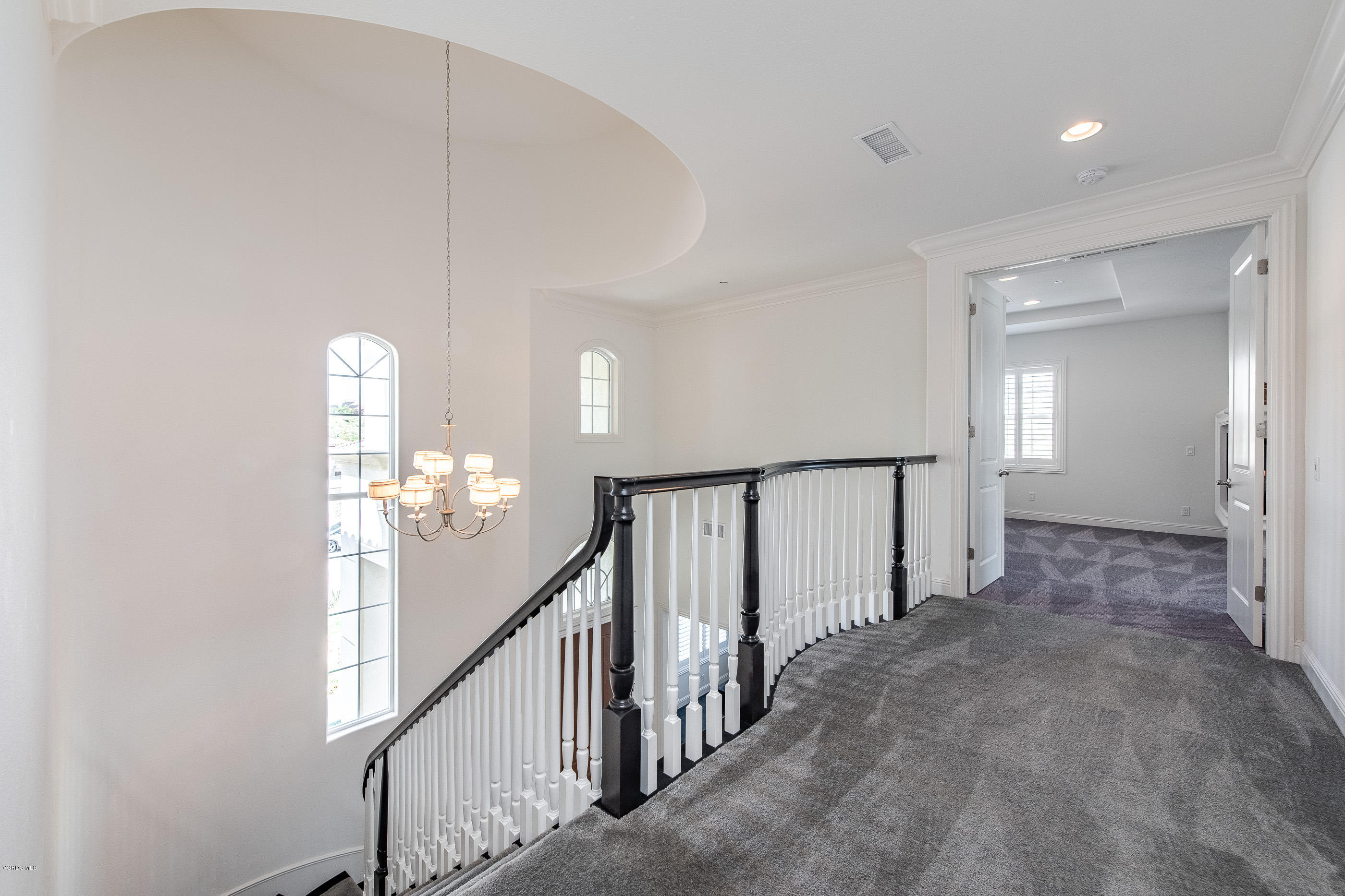 11276 Crenshaw Street Moorpark, CA 93021 - Photo 25 of 52 a view of a hallway with stairs