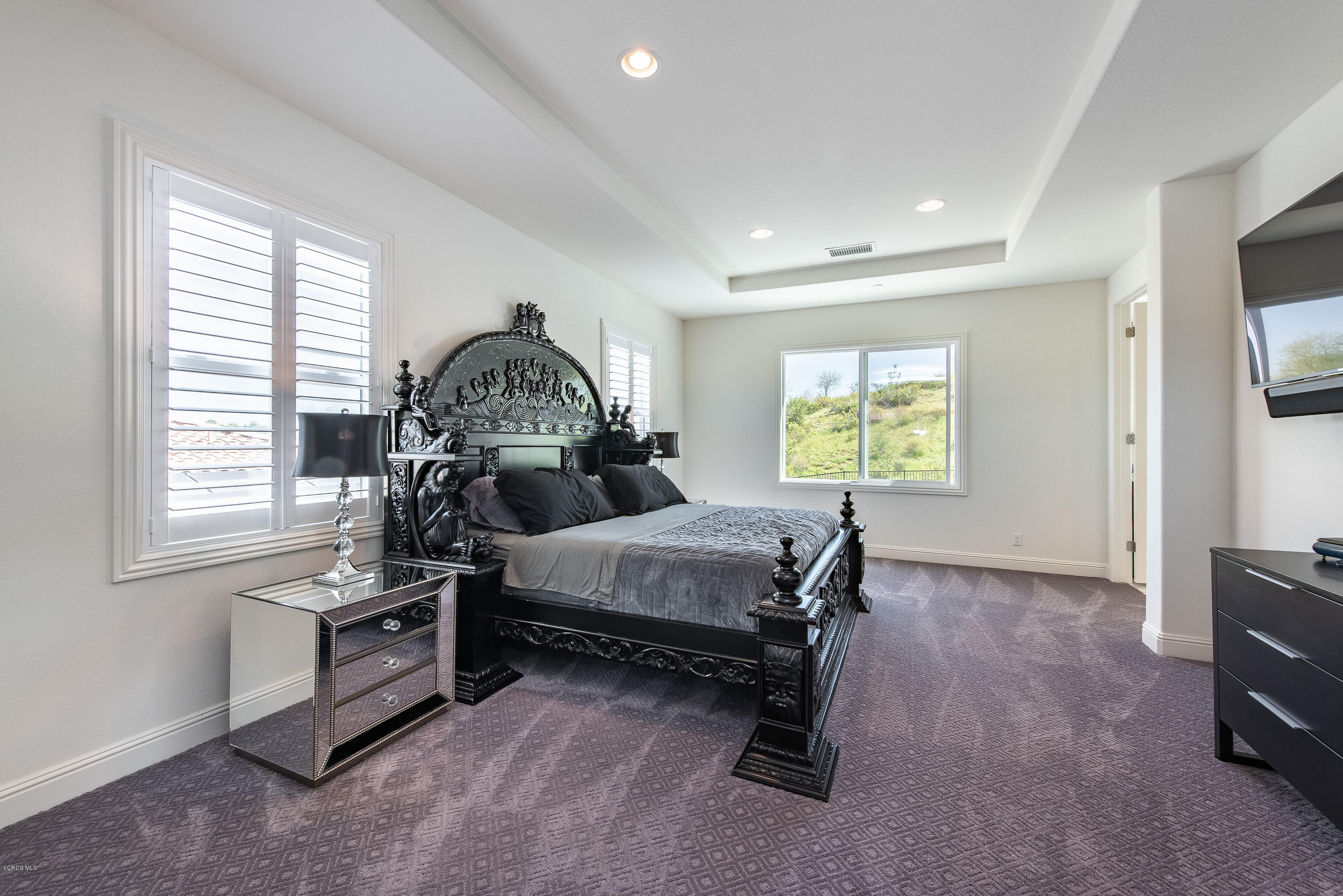 11276 Crenshaw Street Moorpark, CA 93021 - Photo 27 of 52 a living room with furniture a window and a flat screen tv