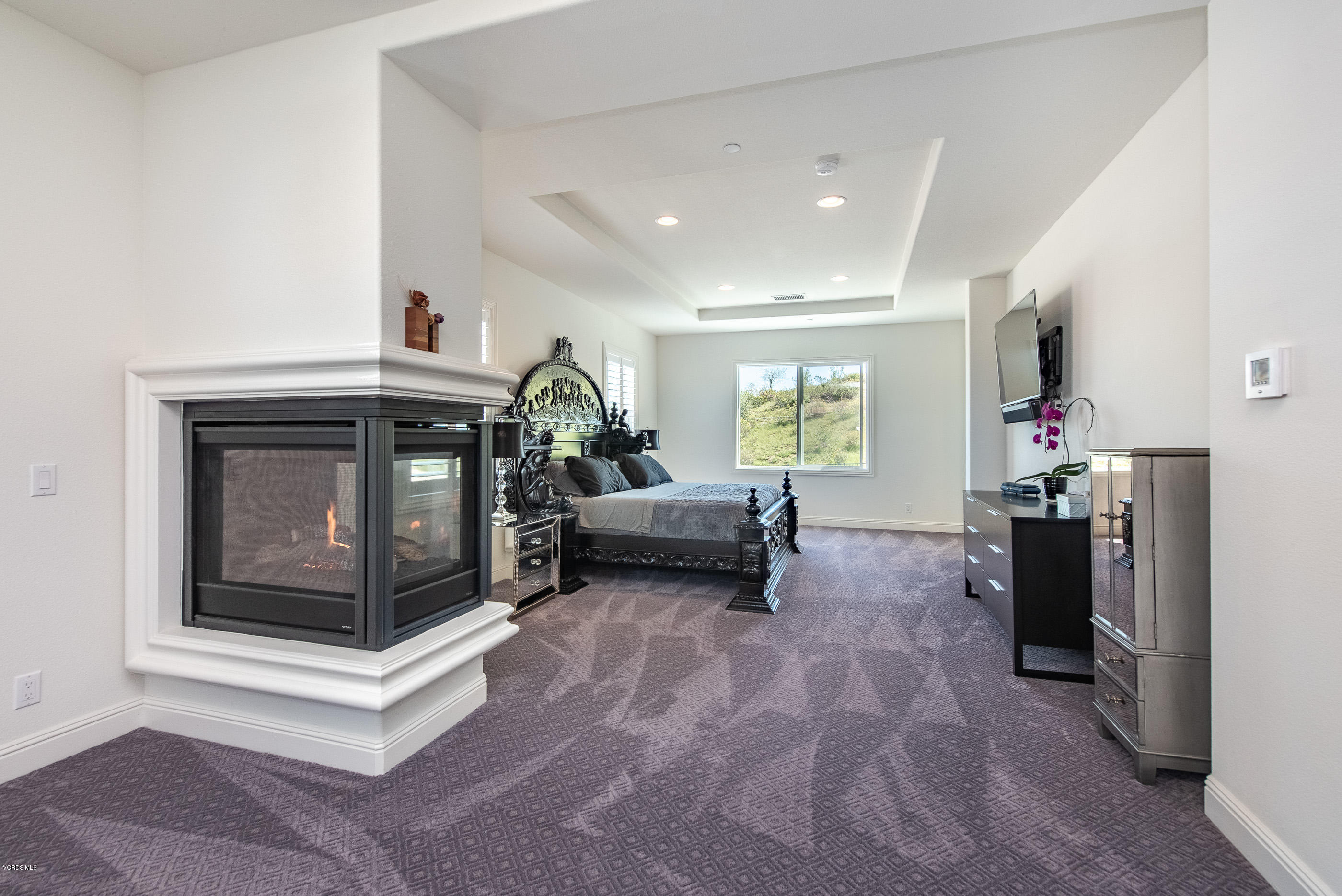 11276 Crenshaw Street Moorpark, CA 93021 - Photo 28 of 52 a living room with furniture and a fireplace