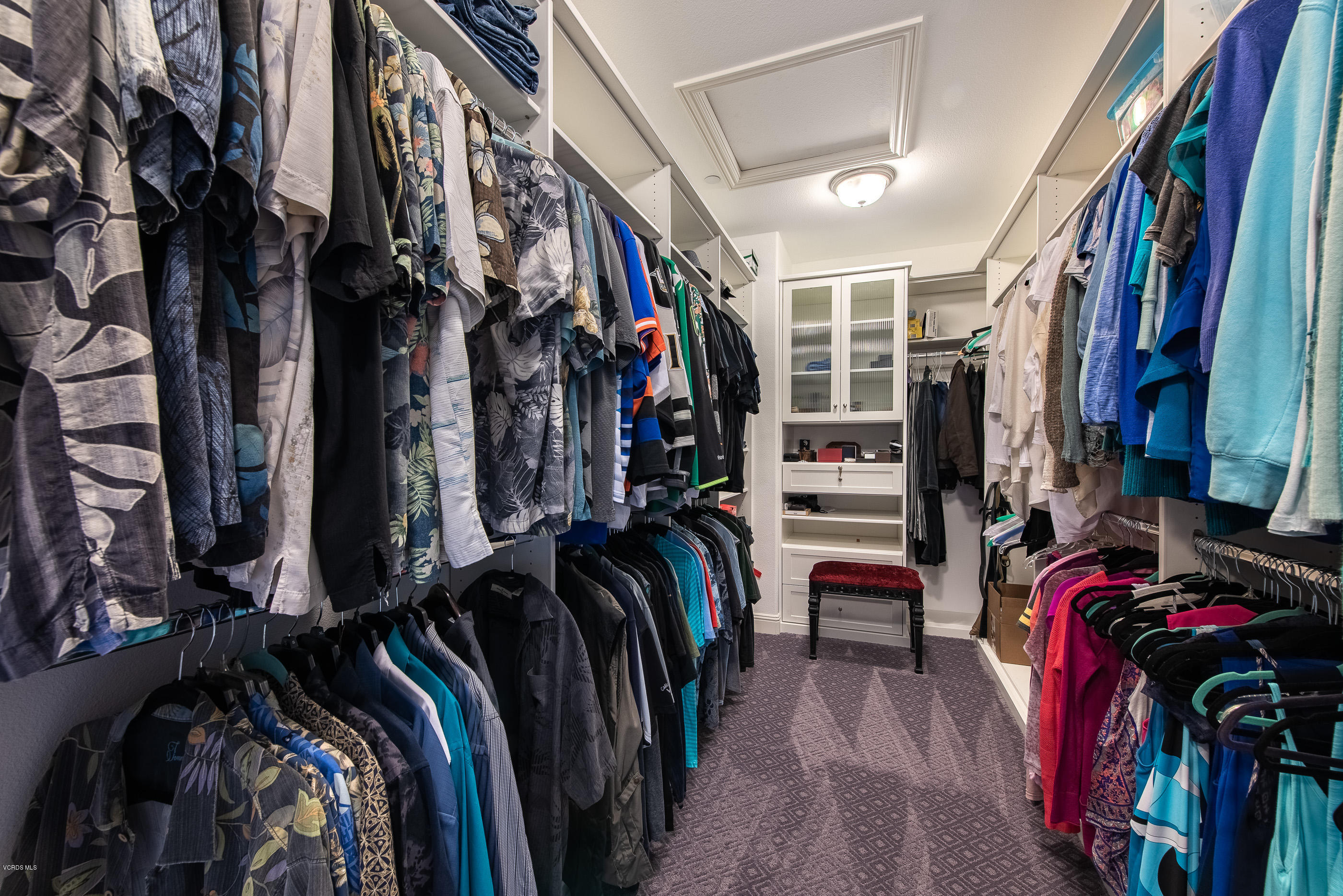 11276 Crenshaw Street Moorpark, CA 93021 - Photo 34 of 52 a view of walk in closet with clothes and shoes