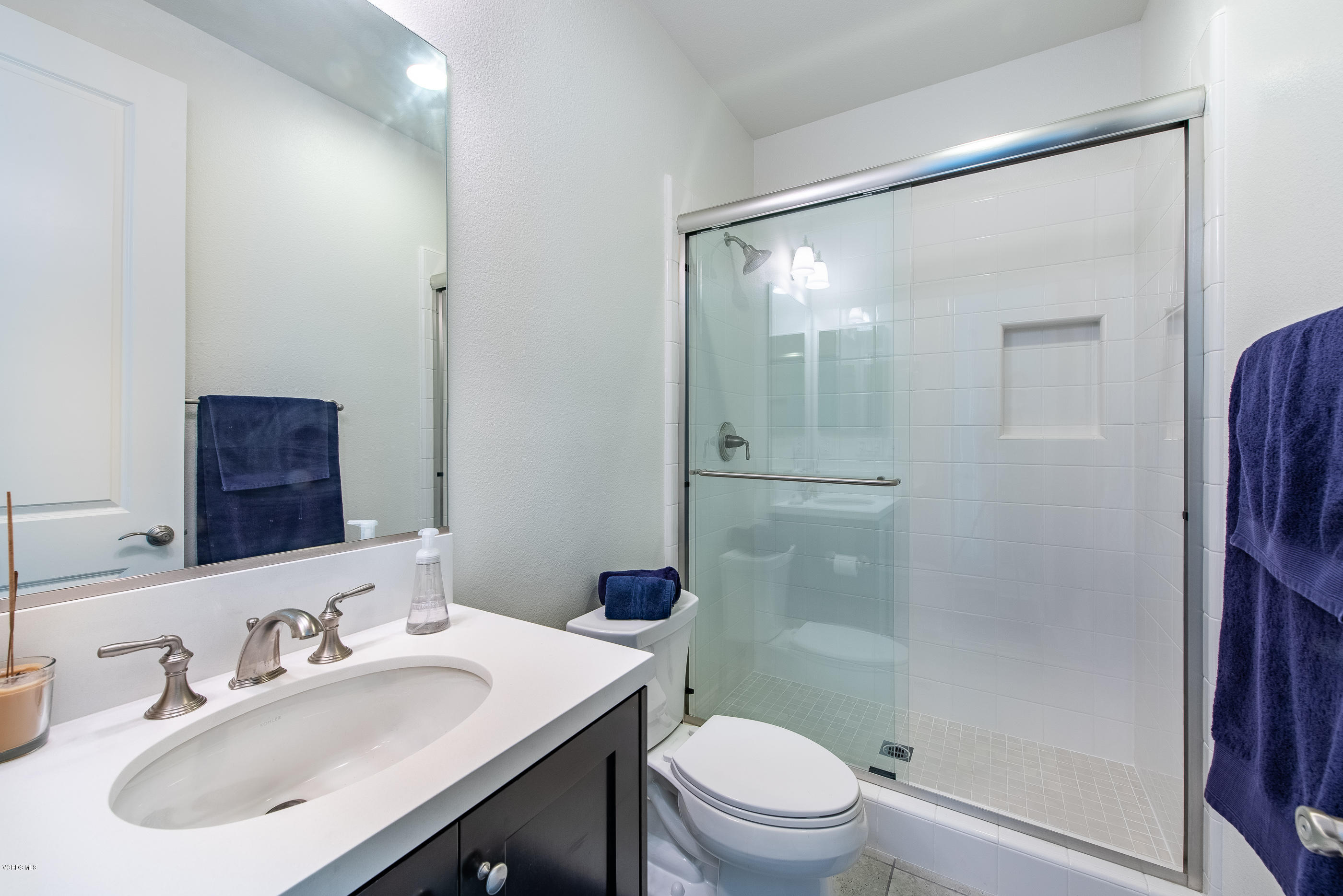 11276 Crenshaw Street Moorpark, CA 93021 - Photo 39 of 52 a bathroom with a sink toilet and shower