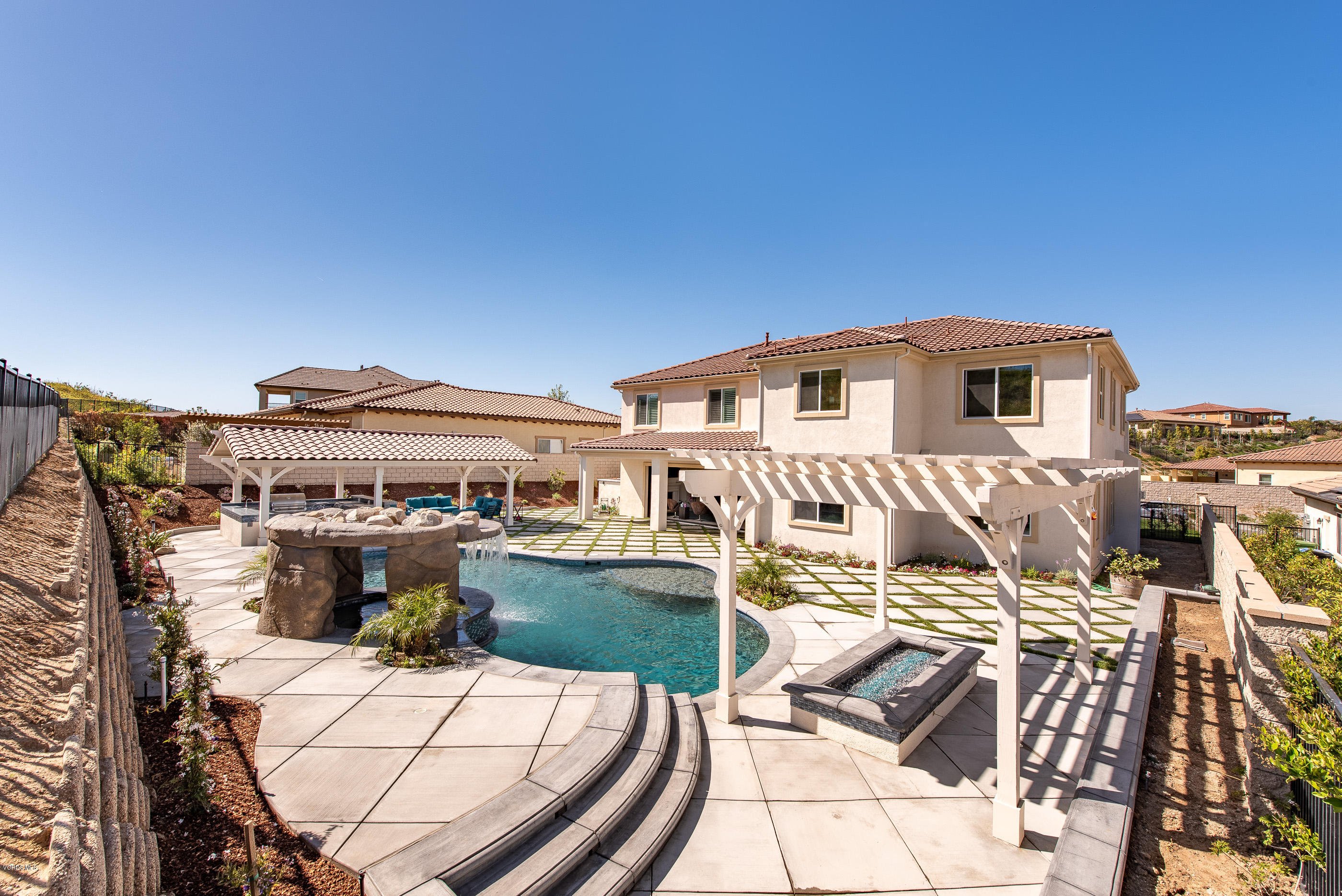 11276 Crenshaw Street Moorpark, CA 93021 - Photo 48 of 52 a view of a house with pool and chairs