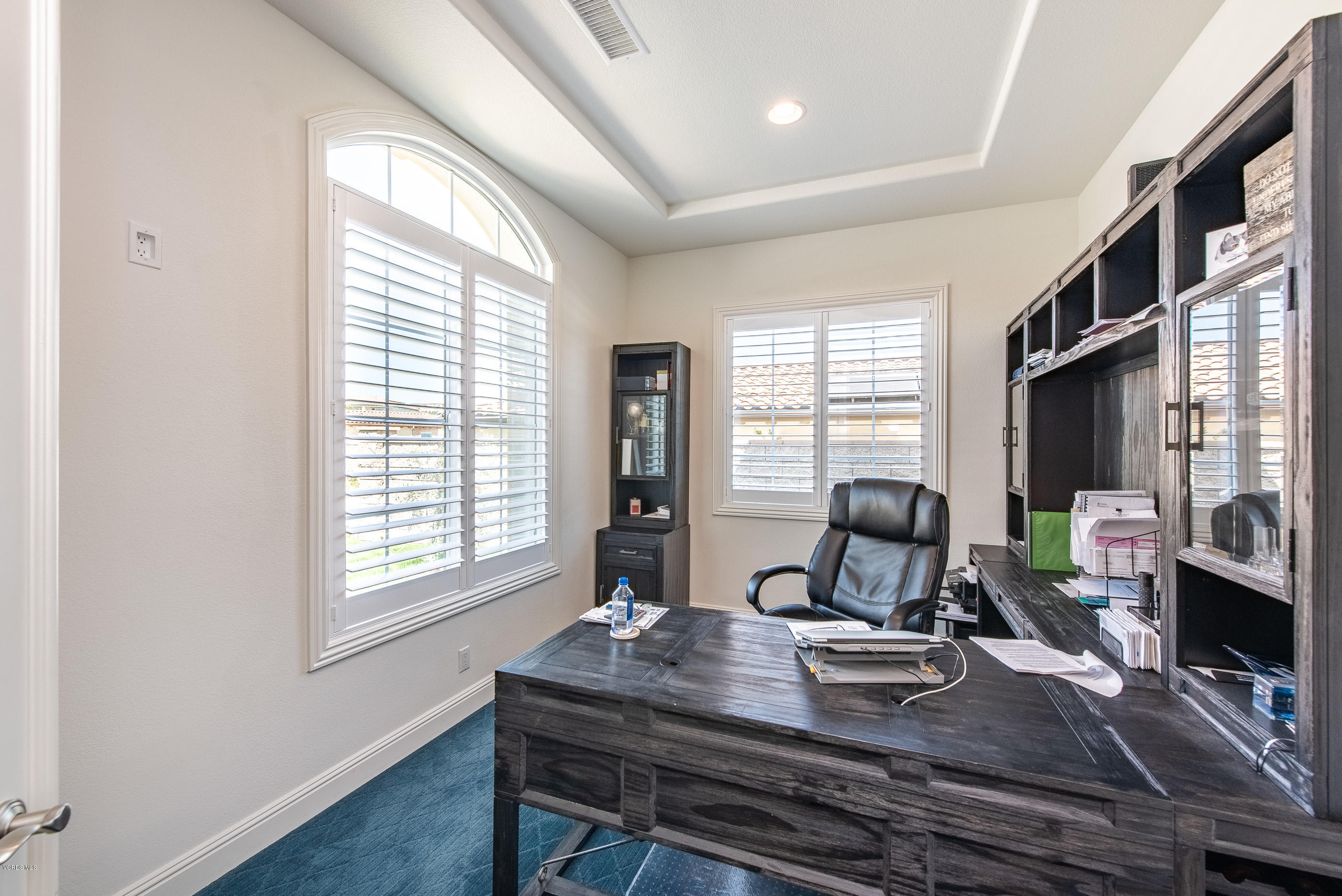11276 Crenshaw Street Moorpark, CA 93021 - Photo 9 of 52 a view of a workspace with furniture and a window