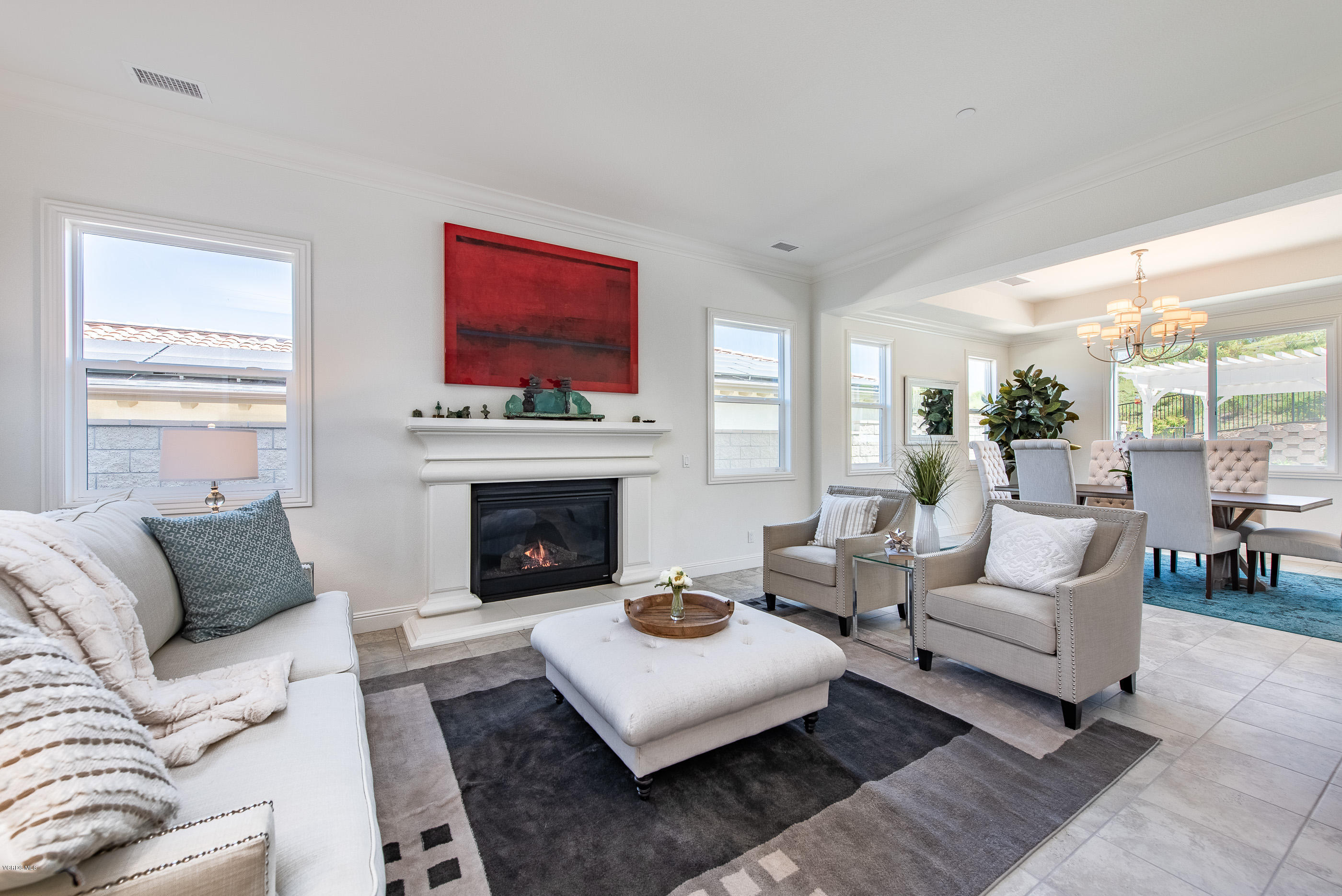 11276 Crenshaw Street Moorpark, CA 93021 - Photo 10 of 52 a living room with furniture and a fireplace