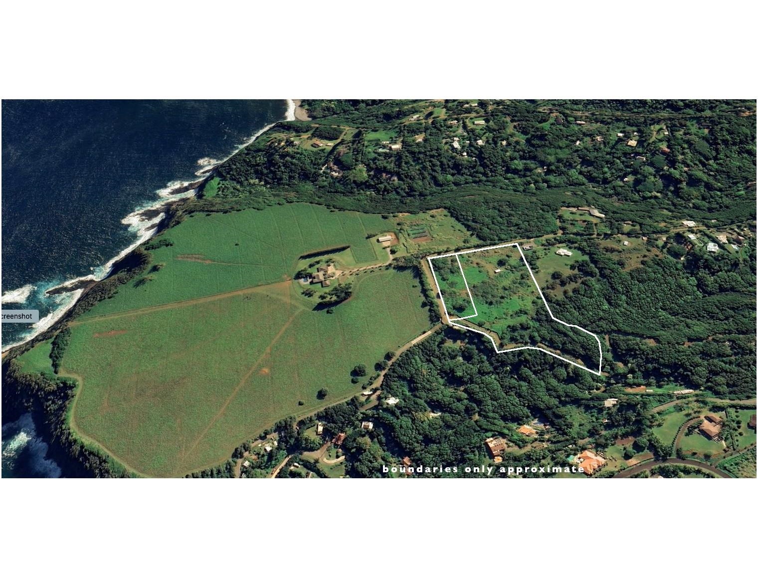 0 Haumana Road, Unit A Haiku, HI 96708 - Photo 22 of 24 an aerial view of a golf course with a lake