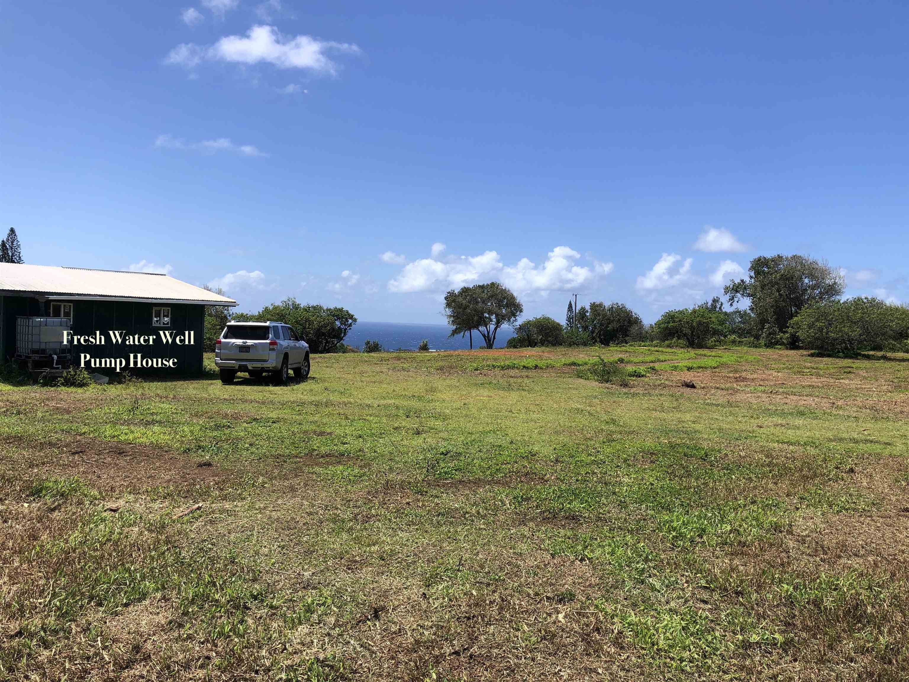 0 Haumana Road, Unit A Haiku, HI 96708 - Photo 10 of 24 a view of a big house with a big yard