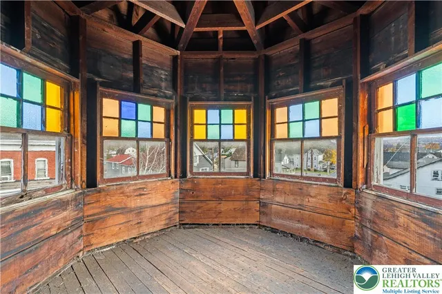 an empty room with windows