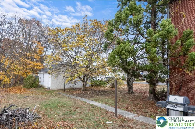 a view of a city with mountains in the background