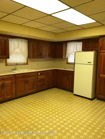 a view of a kitchen with a sink