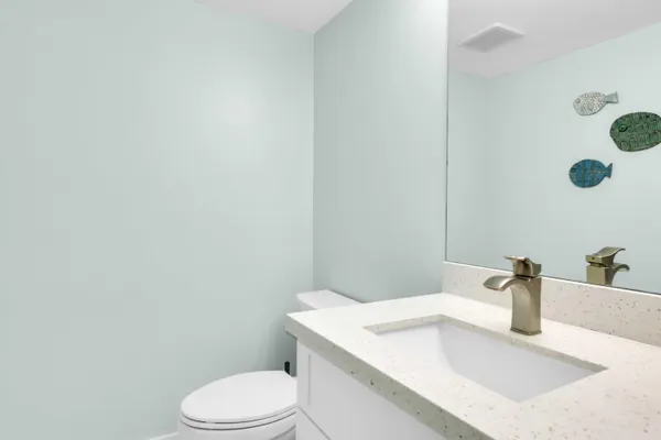 a bathroom with a sink and toilet