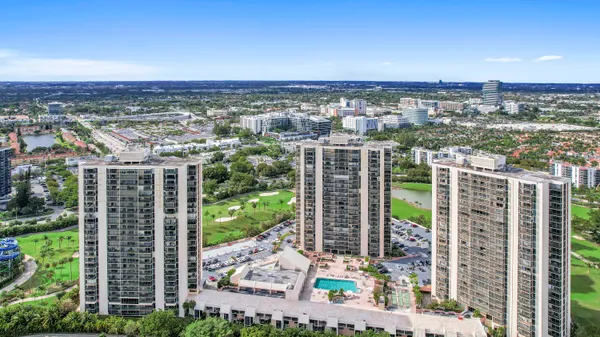 a view of a city with tall buildings