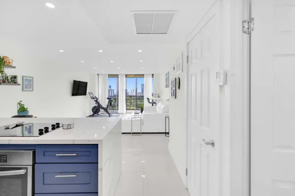 a view of living room with furniture and flat screen tv