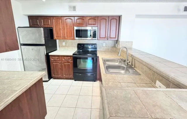 $2,450 | 1715 Village Boulevard, Unit 102, West Palm Beach, FL 33409