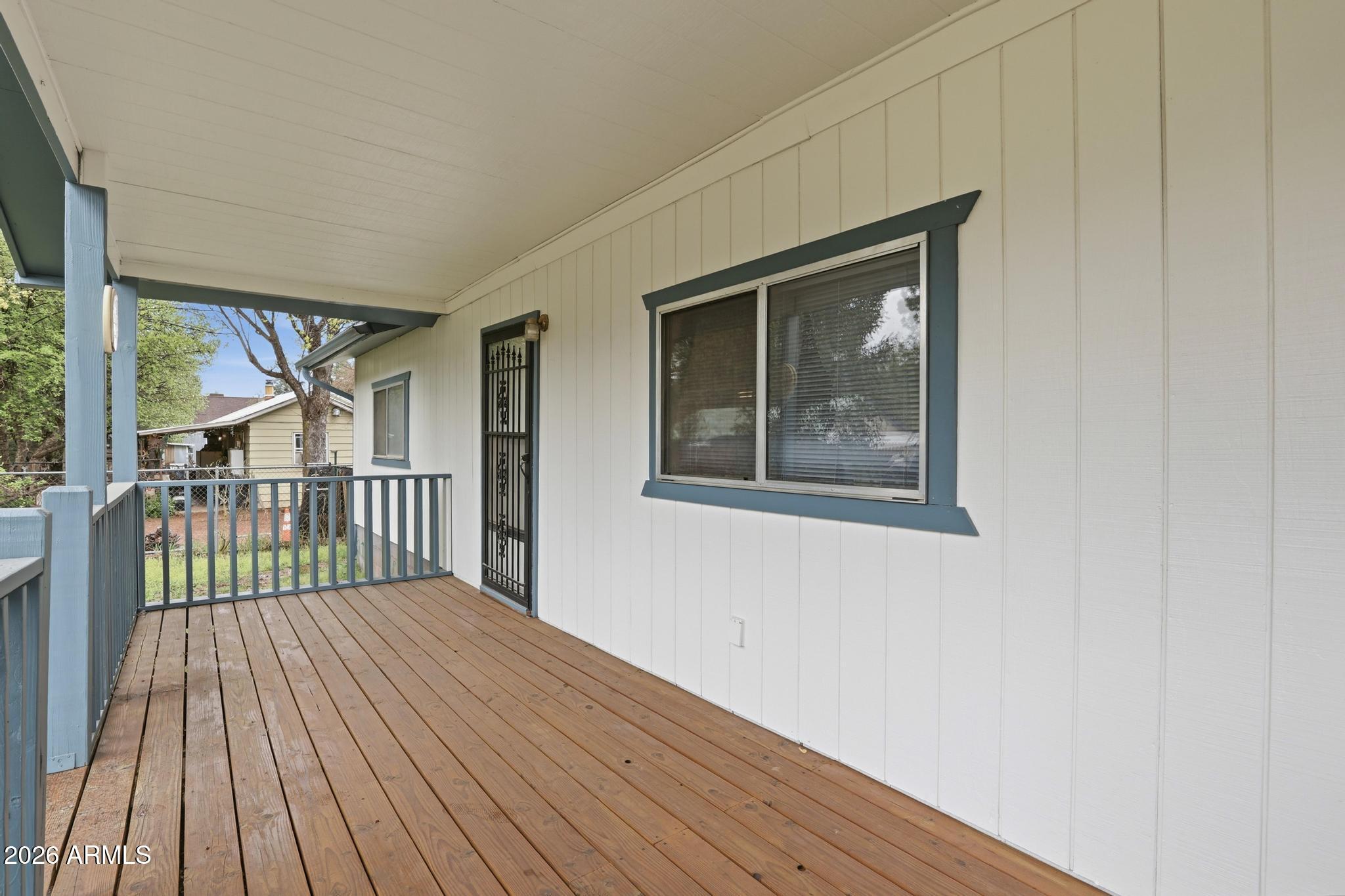 223 Thompson Road Payson, AZ 85541 - Photo 5 of 22 a view of a balcony with wooden floor