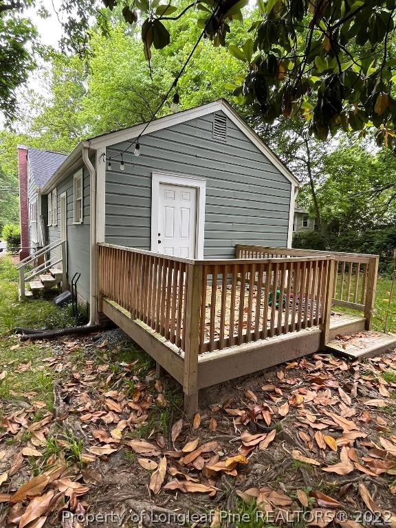 1802 Guess Road Durham, NC 27705 - Photo 6 of 9 a view of a small yard with wooden fence