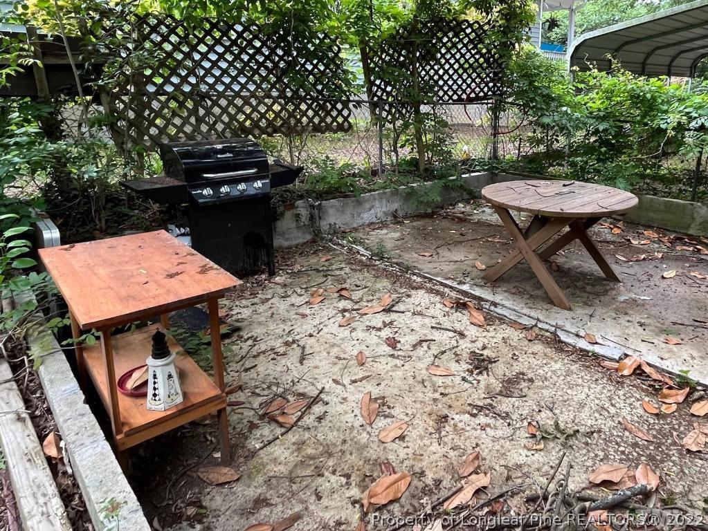 1802 Guess Road Durham, NC 27705 - Photo 7 of 9 a view of a backyard with sitting area