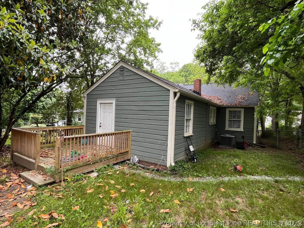 1802 Guess Road Durham, NC 27705 - Photo 8 of 9 a view of a house with a yard