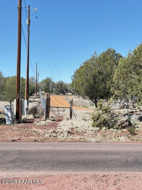 4176 Double A Ranch Road Williams, AZ 86046 - Photo 14 of 17 a white house with a yard
