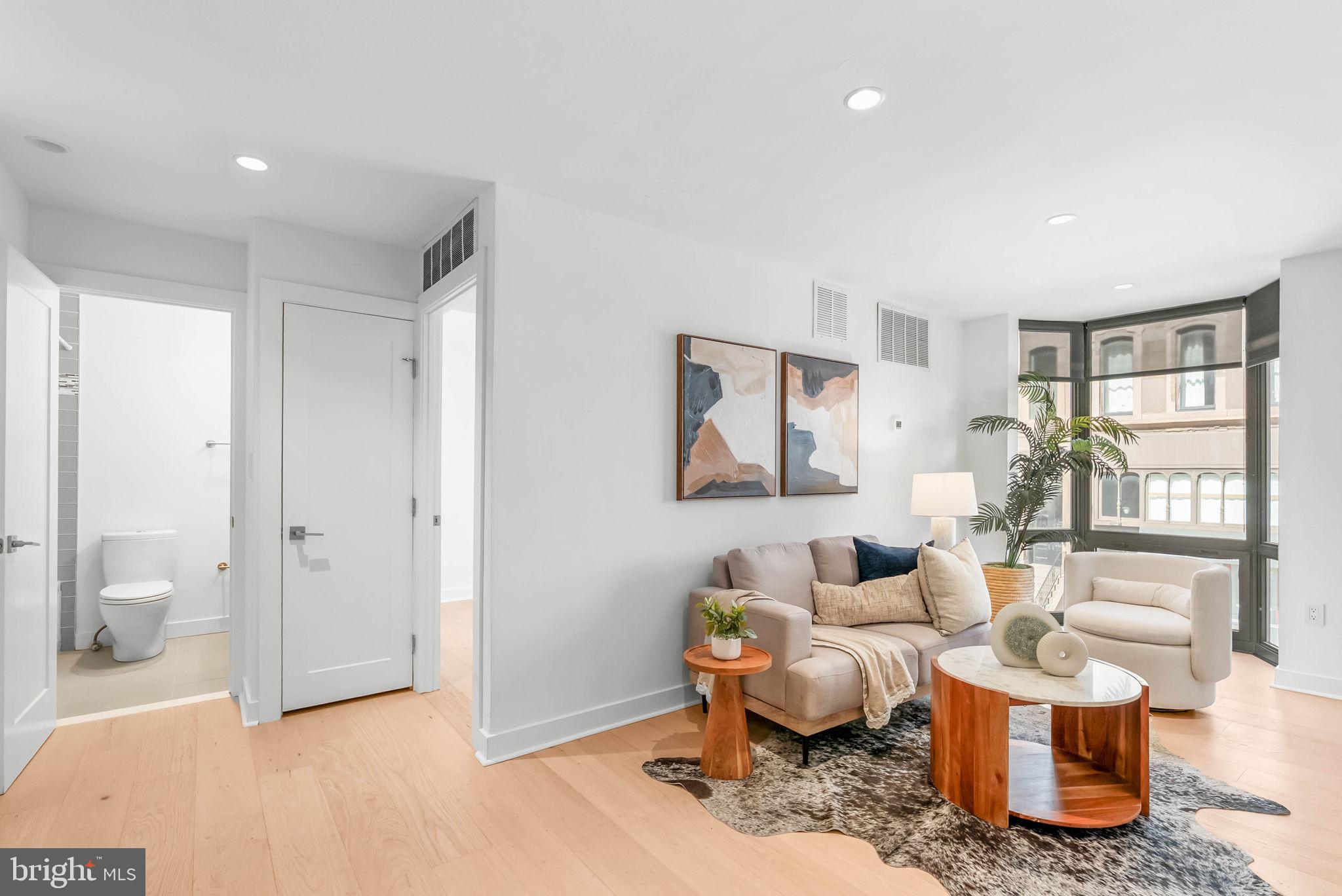 2018 Walnut Street, Unit 2018 Philadelphia, PA 19103 - Photo 16 of 52 a living room with furniture and a window