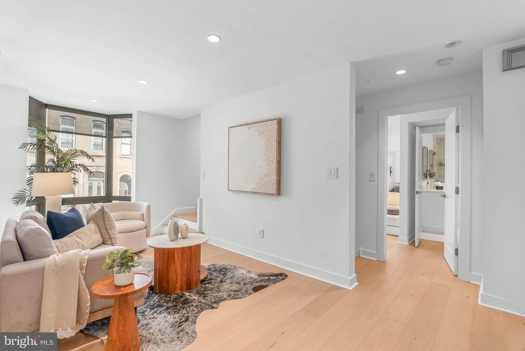 2018 Walnut Street, Unit 2018 Philadelphia, PA 19103 - Photo 17 of 52 a living room with furniture and a window