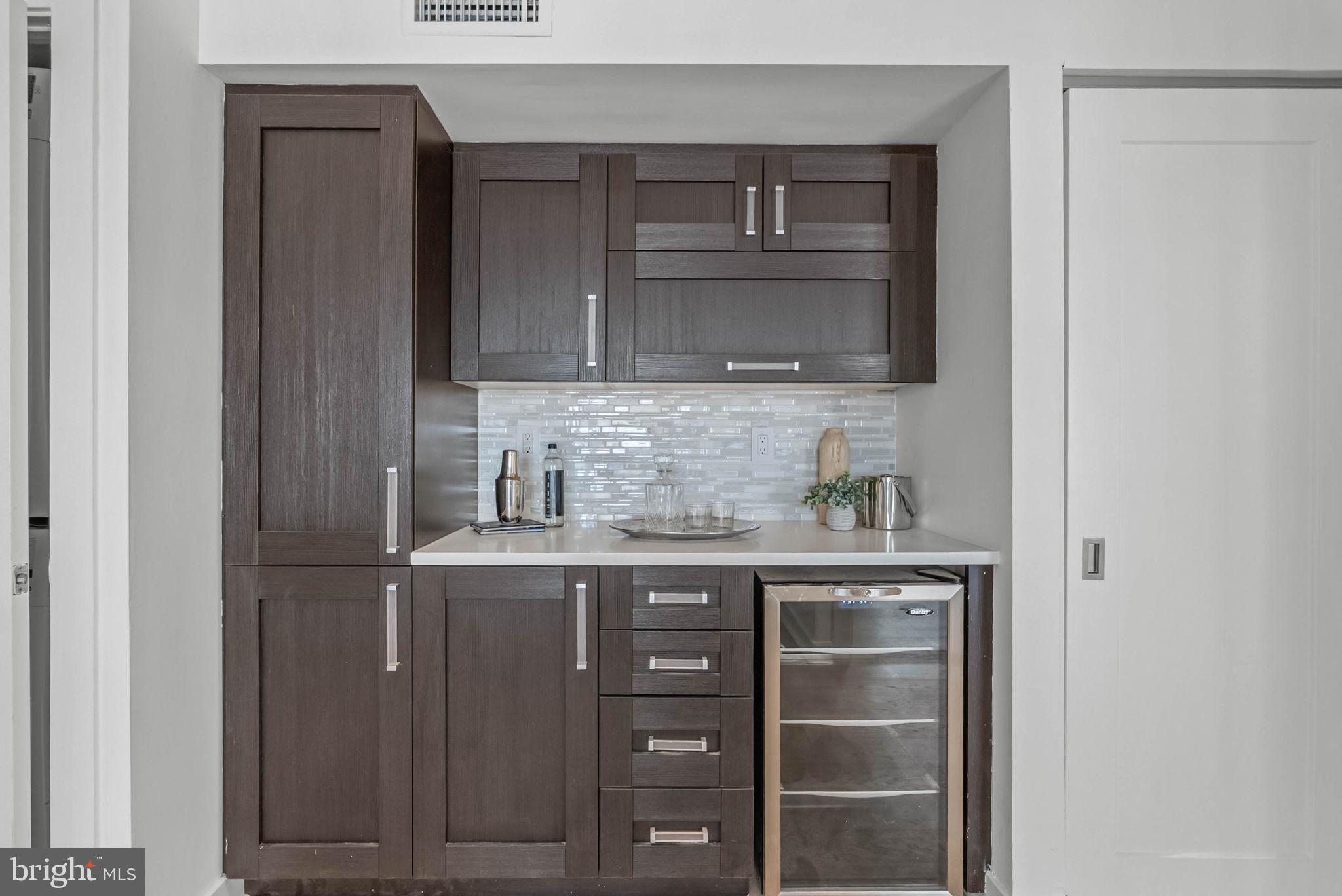 2018 Walnut Street, Unit 2018 Philadelphia, PA 19103 - Photo 20 of 52 a kitchen with a cabinets and a stove top oven